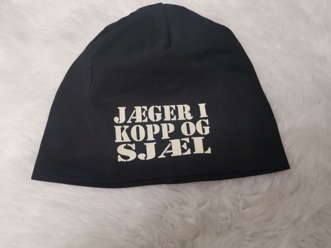 Hovedbilde Lue ~ Jæger i kopp og sjæl 